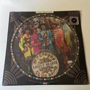 Rare limited edition SEALED Sgt. Pepper picture disc.
